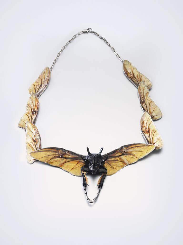 Necklace with beetle by Bartosz Mary Chmielewski; Materials: silver, chitin, beetle wings